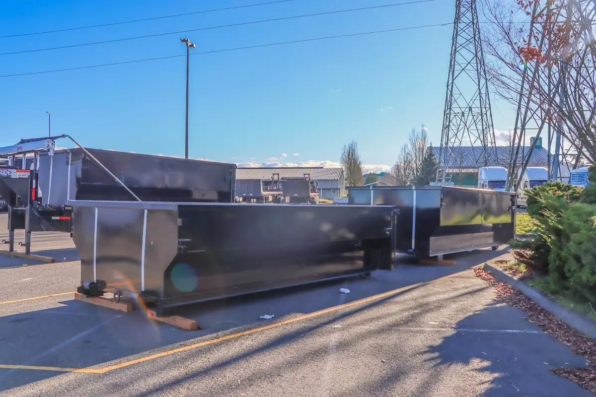 Roll-off dumpster ready for waste disposal at job site for Construction Dumpster Rental in Candler-McAfee